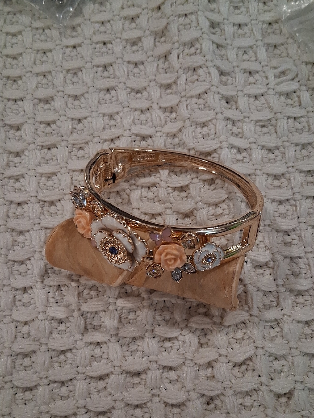 Guess Gold-Tone Floral Bracelet with Peach and White Accents